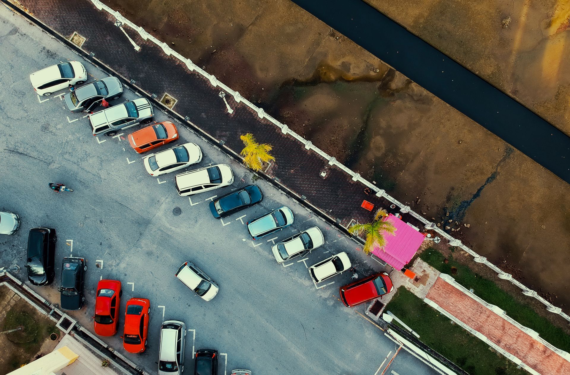 Commercial parking lot striping in Jacksonville Florida with white stall lines on asphalt